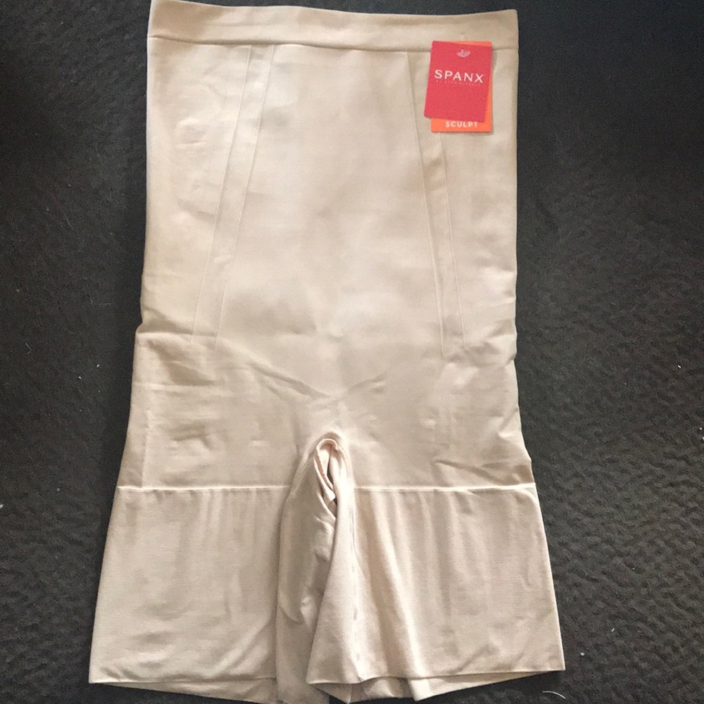 Spanx sculpt high waist mid thigh shape wear.